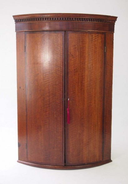 Antique Georgian Oak Bow Front Corner cabinet