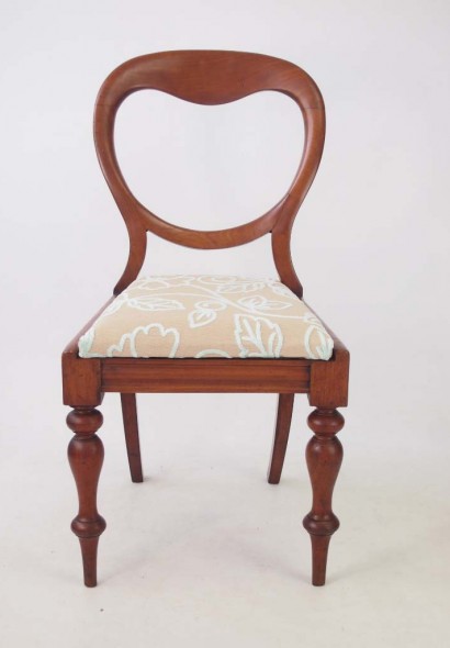 A charming antique Victorian chair in mahogany.