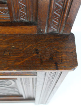 A Small Edwardian Carved Oak Court Cupboard